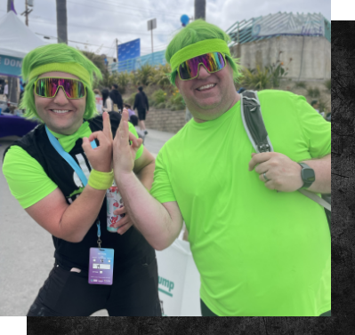 Dustin and Bryce at event both wearing lime green hair and glasses