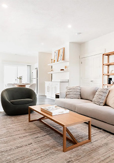 Couch, chair and coffee table in a Klein living room